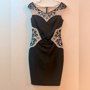 Black and Creme bodycon dress. Worn few times. Like new!